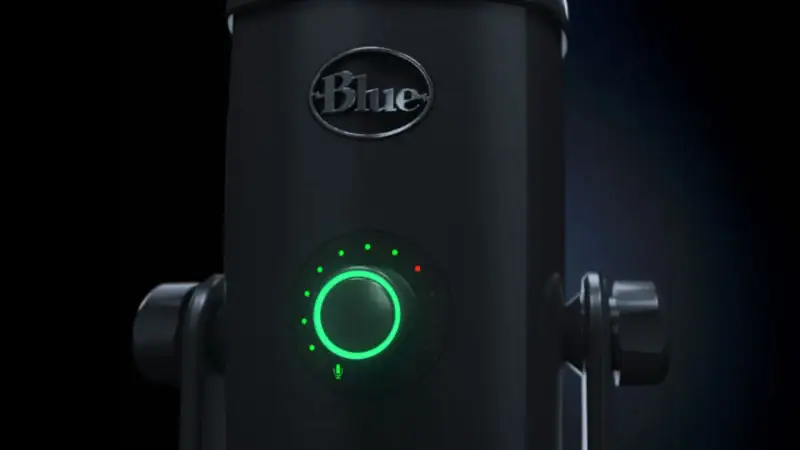 Close-up of the Blue Yeti X microphone's glowing LED meter and smart knob
