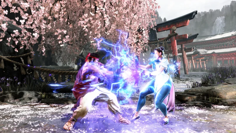 Ryu and Chun-Li trade lightning-charged attacks under cherry blossoms in Street Fighter 6
