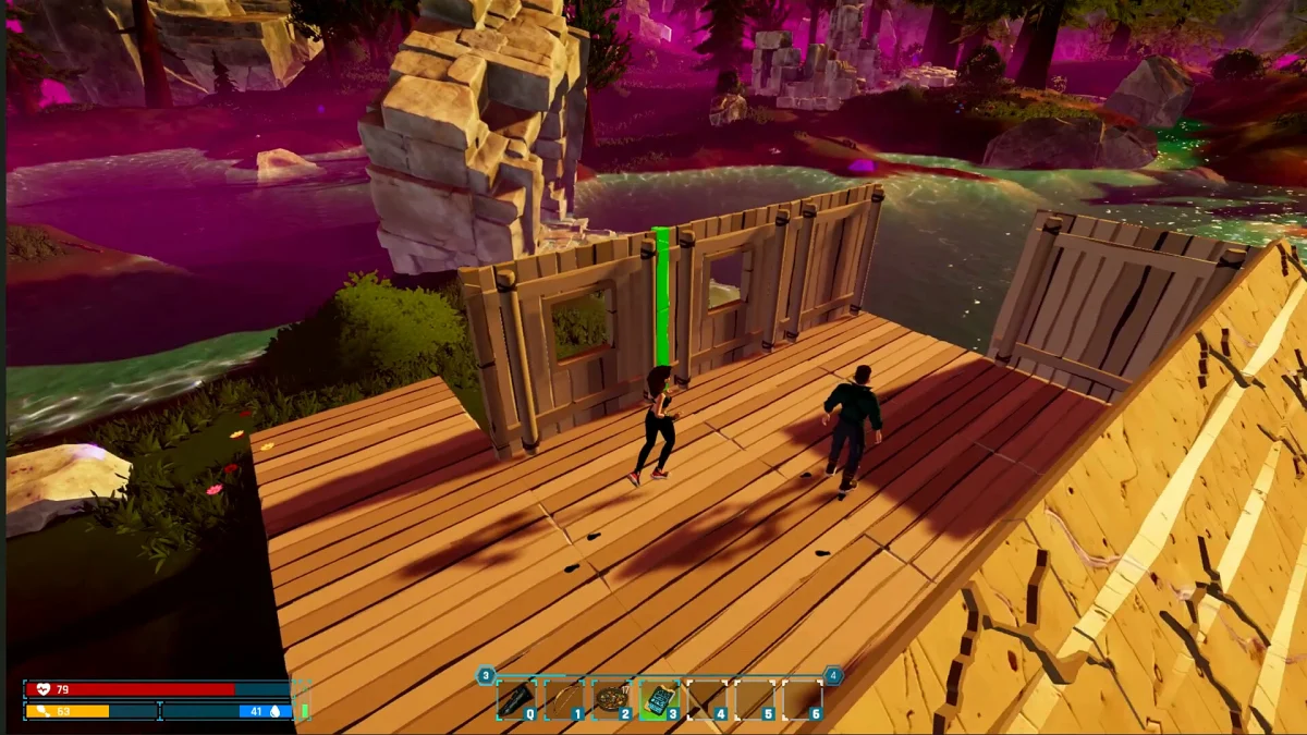 Two players build a wooden base on a cliff under a pink alien sky in Wildsite
